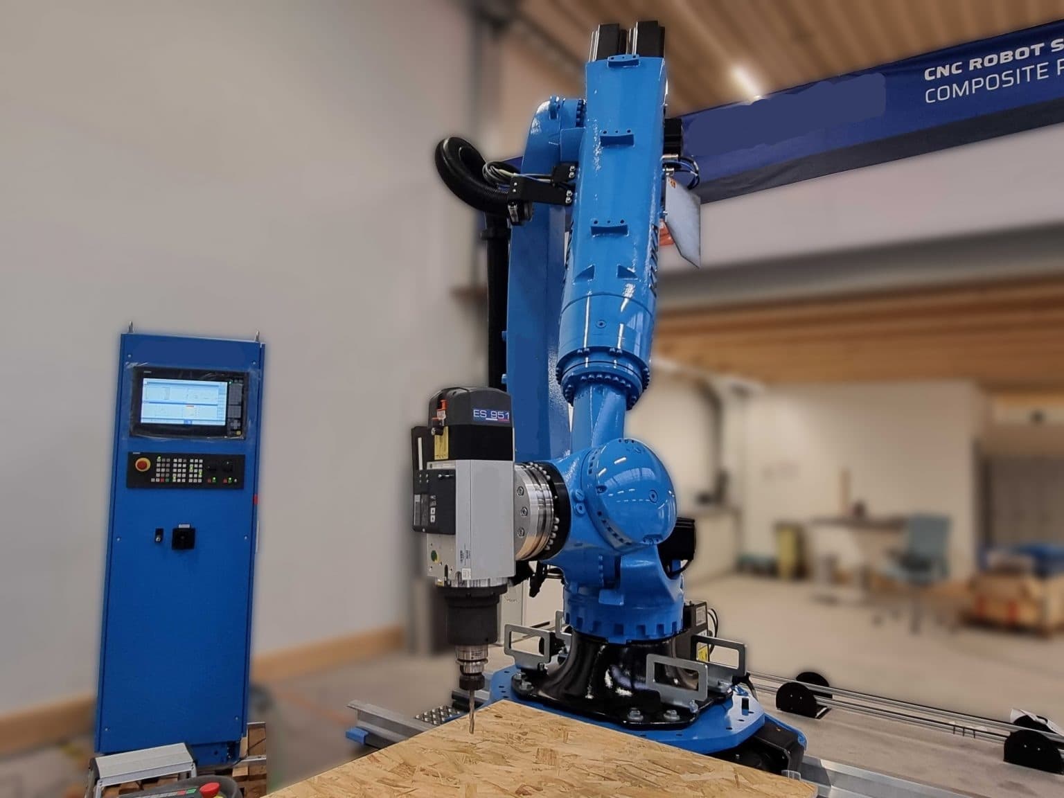 Autonomous CNC robotic woodworking cell